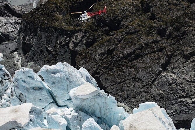 50-Minute Glacier Explorer & Earnslaw Burn Flight, Queenstown - Landing on a glacier in Mt Aspiring National Park