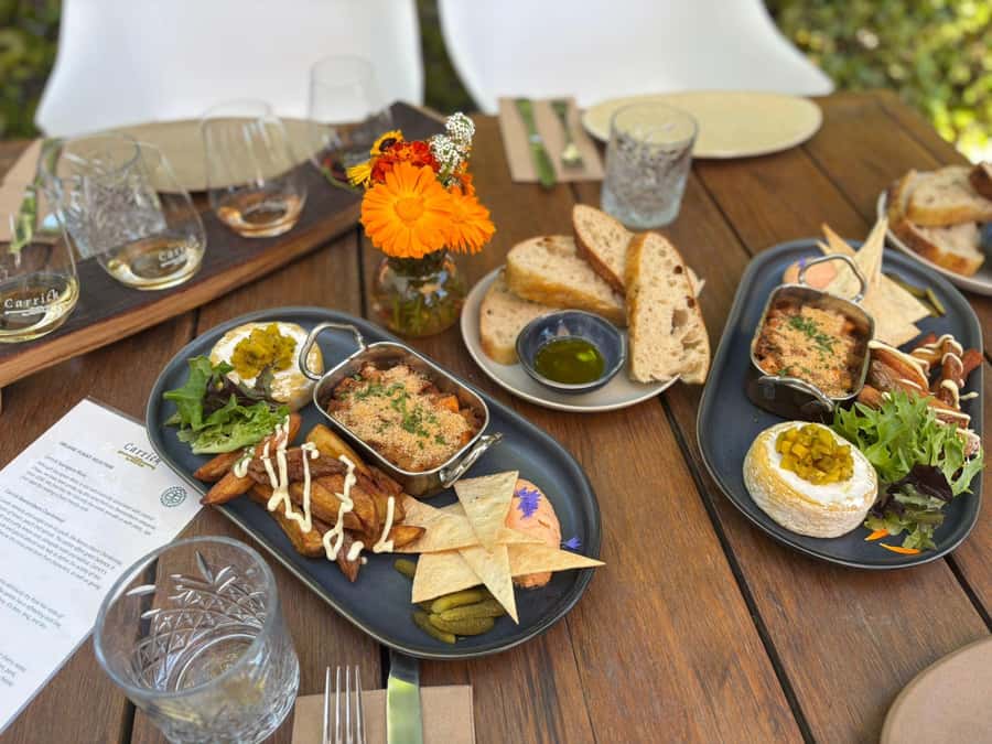 Boutique Winery Half-Day Tour & Vineyard Platter-Style Lunch - The optional jet boat or golf upgrade