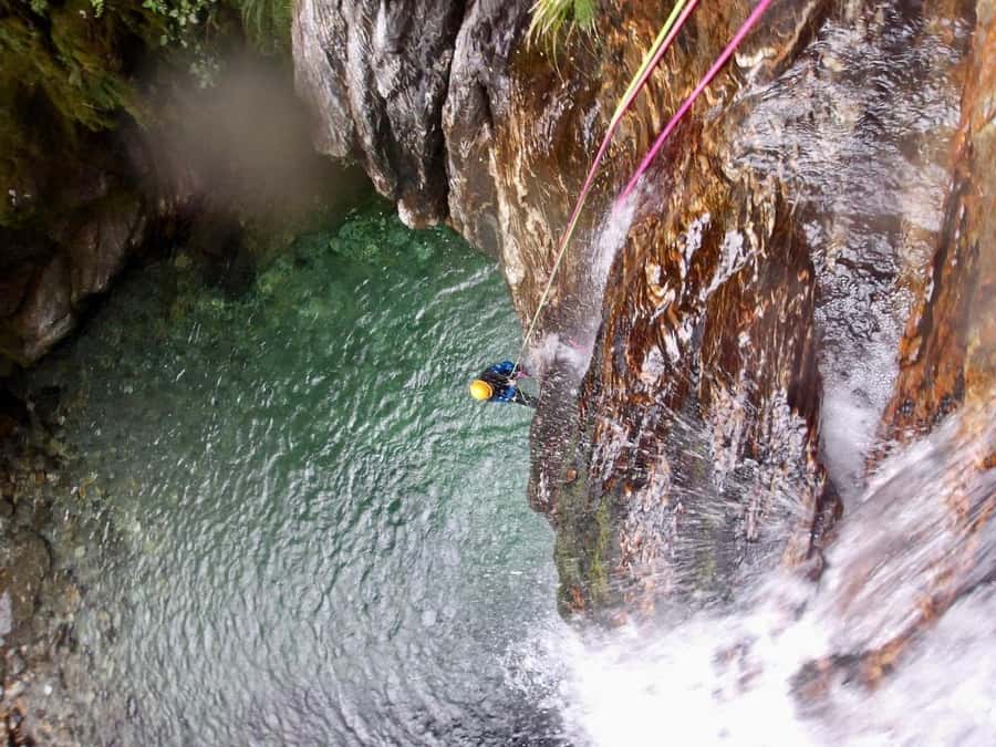 From Queenstown: Mount Aspiring Full-Day Canyoning Adventure - Walking, climbing, jumps, and slides