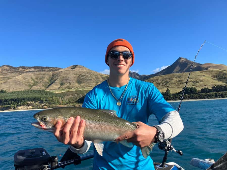 Lake Wakatipu: 3 Hour Fishing Adventure by Boat - Getting set up with premium rods and downriggers