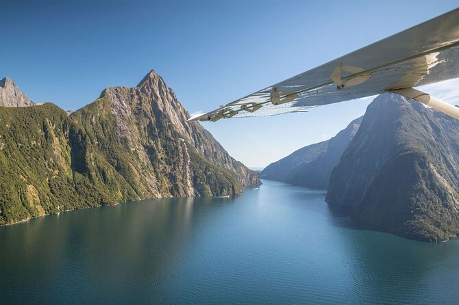 Premium Milford Sound Tour Including Cruise, Flight & Lunch - Leaving Queenstown beside Lake Wakatipu