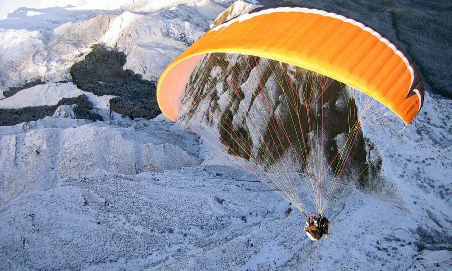 Queenstown: Tandem Paraglide - Winter - Coronet Peak 5400ft - Safety briefing, harness checks, and the first few steps