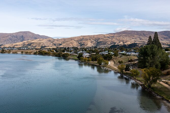 Queenstown to Dunedin with Taieri Gorge Train One-Way Tour - Leaving Queenstown through Gibbston and Kawarau Gorge