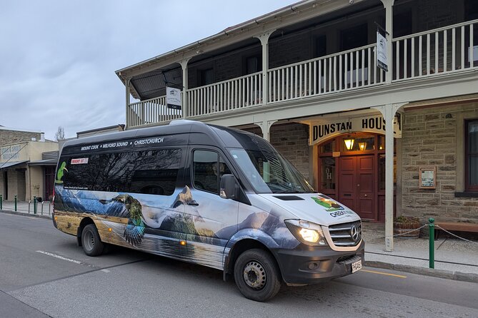 Queenstown to Dunedin with Taieri Gorge Train One-Way Tour - Boarding the train at remote Pukerangi